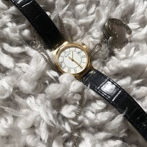 Mido black leather band watch with gold hardware